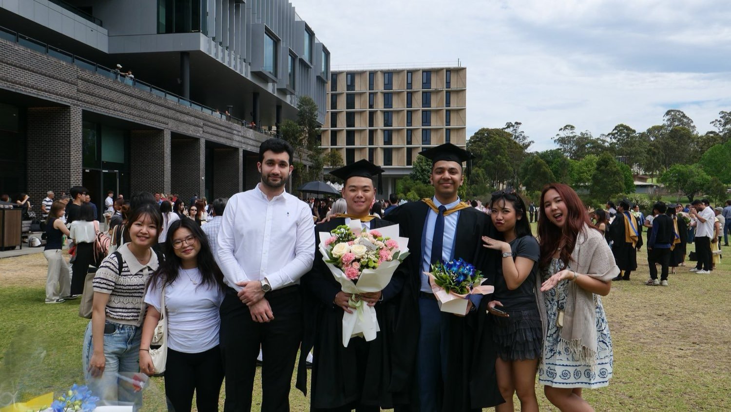 Shahriar celebrating graduation with friends