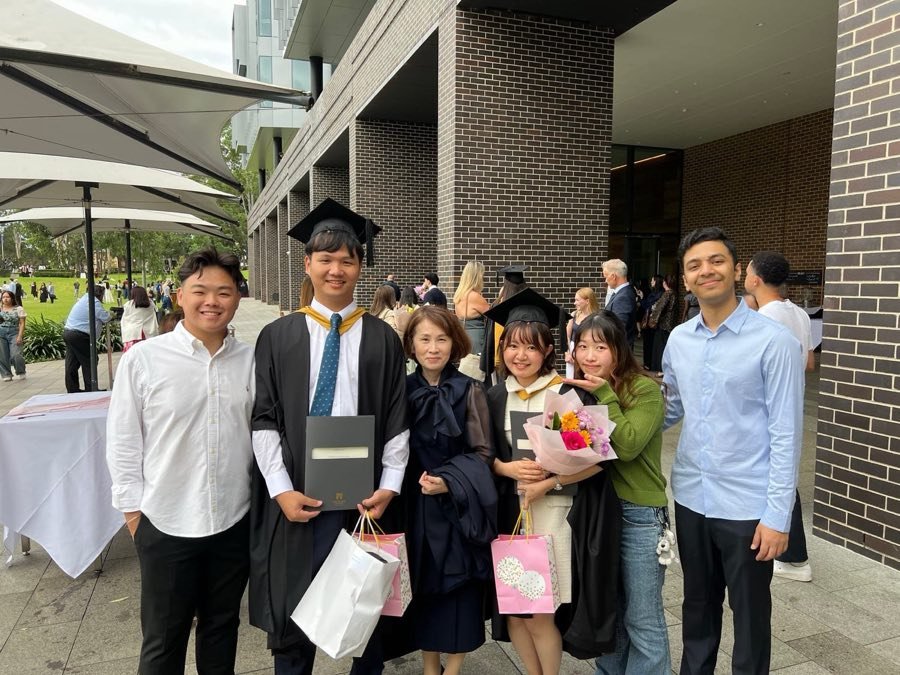 Celebrating in the courtyard after graduation